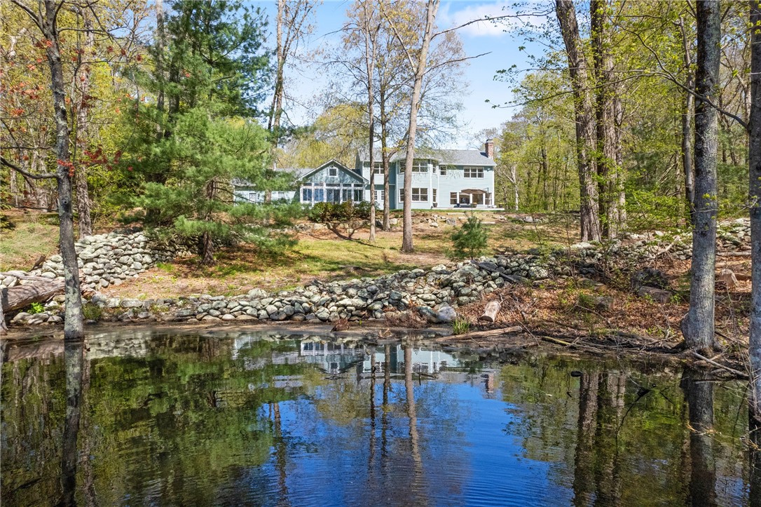 66 Tarklin Road Smithfield, RI 02814 - Photo 5 of 50 View from the pond of the back of the home