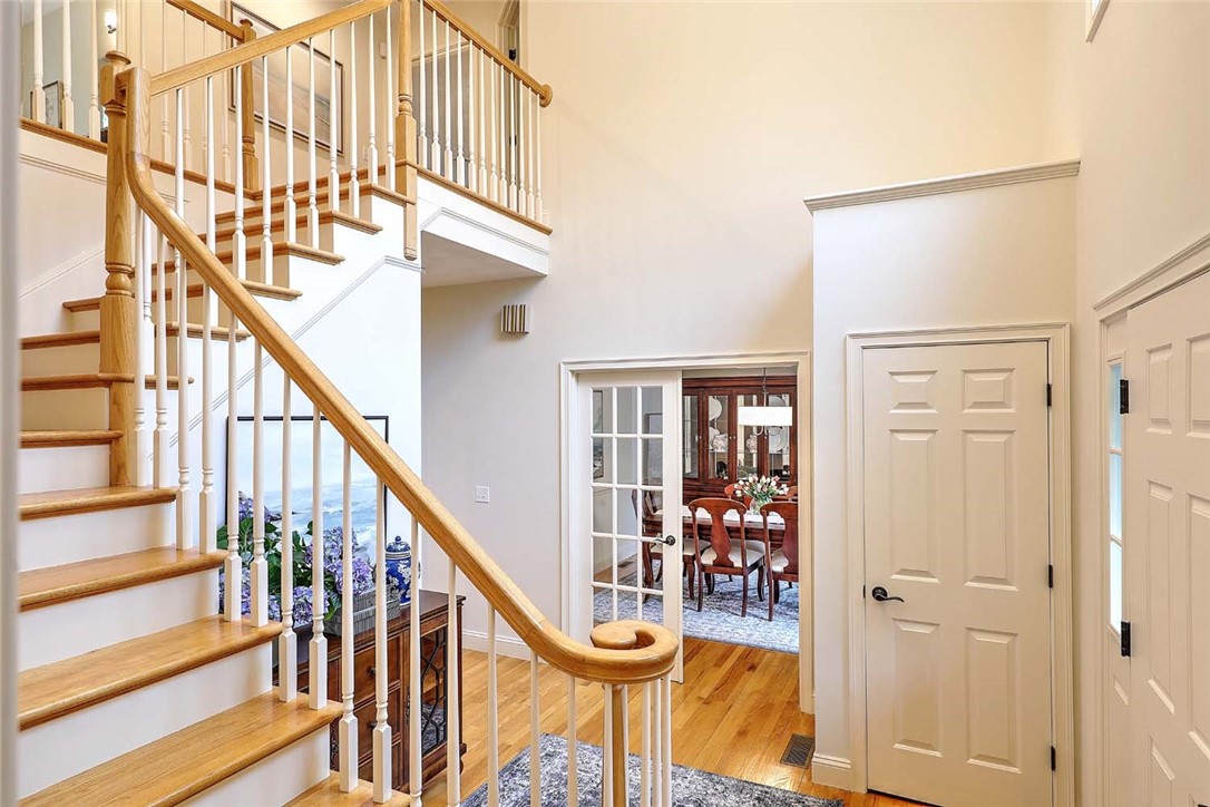 66 Tarklin Road Smithfield, RI 02814 - Photo 7 of 50 Front Entry with curved staircase to the 2nd level