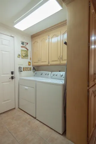 a utility room with washer and dryer
