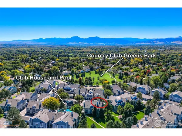 a view of a city with a lake