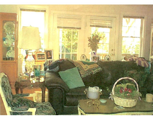 15 Bayview Road Marblehead, MA 01945 - Photo 2 of 6 a living room with furniture and a large window