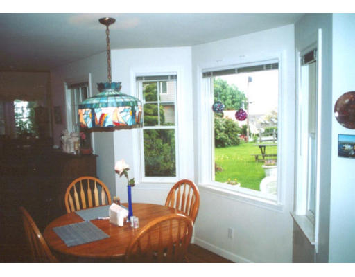 15 Bayview Road Marblehead, MA 01945 - Photo 4 of 6 a outdoor living room with furniture a window and outer view