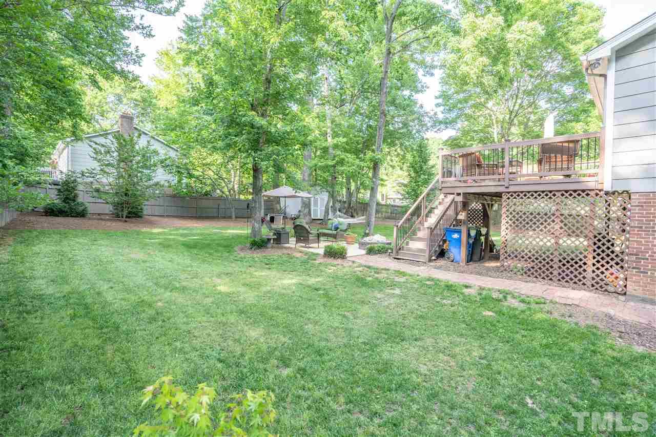 7500 Mine Valley Road Raleigh, NC 27615 - Photo 18 of 25 a view of a house with backyard and a slide