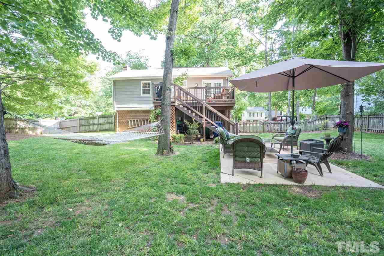 7500 Mine Valley Road Raleigh, NC 27615 - Photo 21 of 25 a view of a house with a deck and a slide