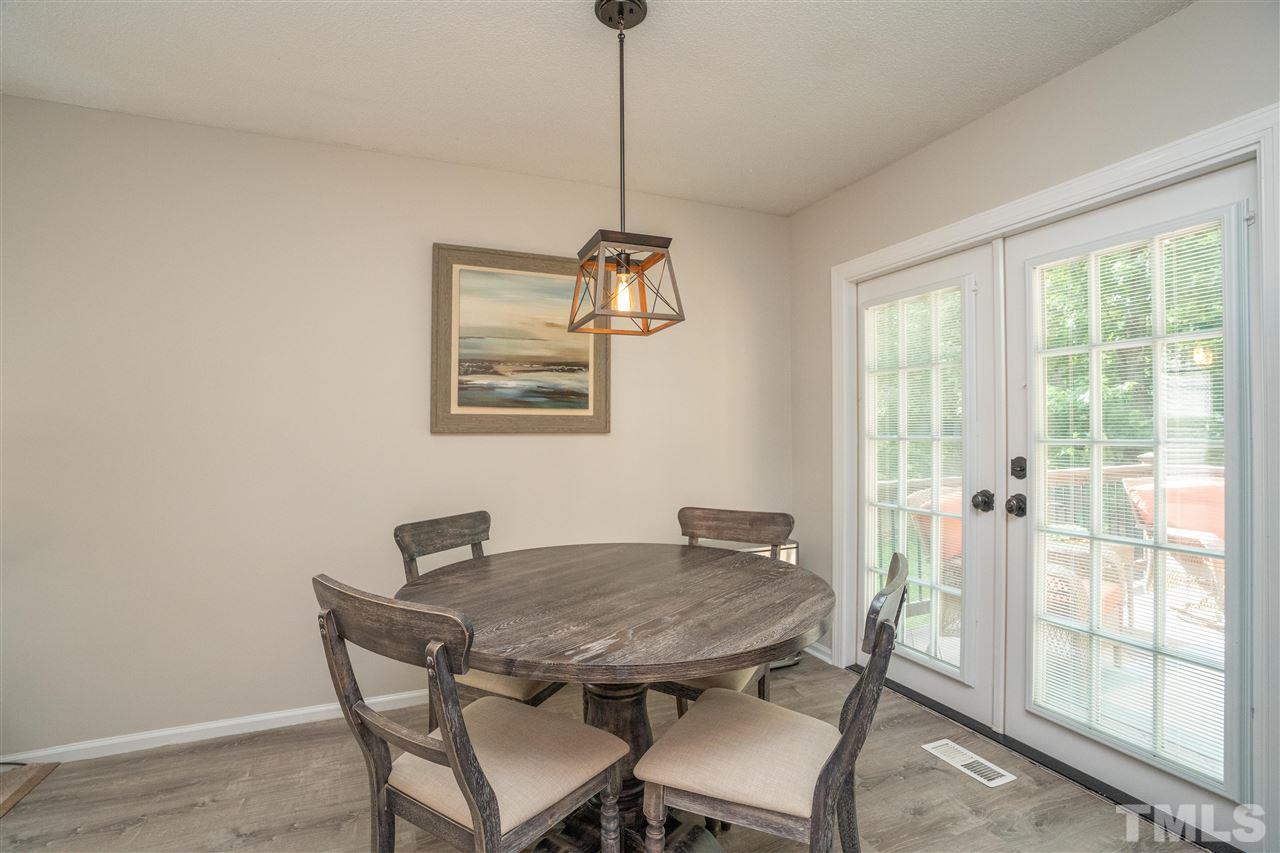 7500 Mine Valley Road Raleigh, NC 27615 - Photo 5 of 25 a dining room with furniture and window