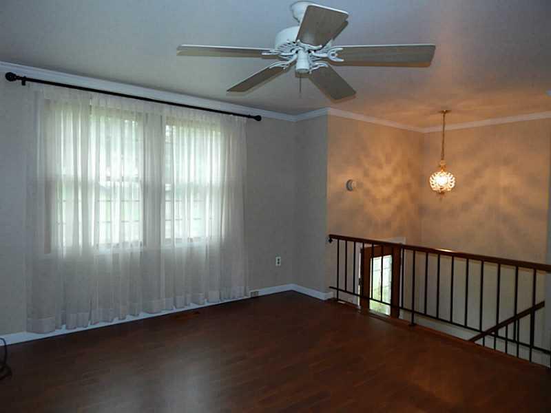 198 Hunting Creek Road Canonsburg, PA 15317 - Photo 2 of 22 Living Room. Pergo floors for low maintenance, ceiling fan with light, freshly painted