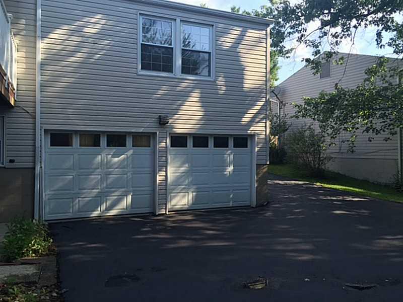 198 Hunting Creek Road Canonsburg, PA 15317 - Photo 20 of 22 Parking Lot/Garage. Two car garage with level driveway for basketball hoop and additional cars to park.