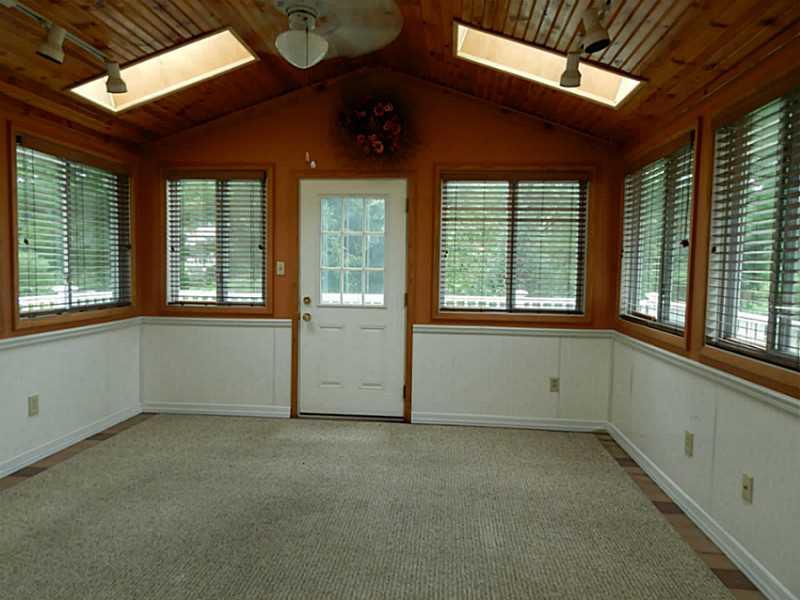 198 Hunting Creek Road Canonsburg, PA 15317 - Photo 4 of 22 Sunroom. Four season room with sky lights and wall of windows, door to deck