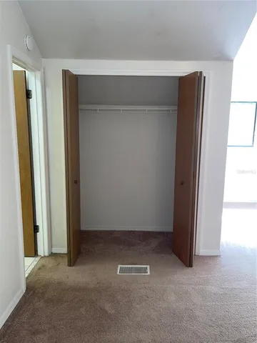 an empty room with closet