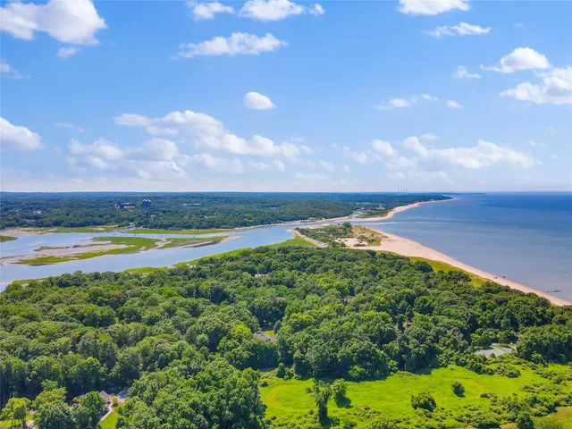 a view of a lake with a yard