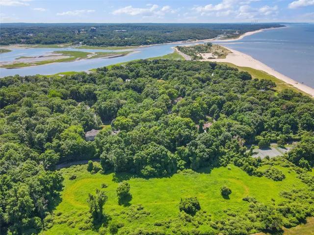 a view of a lake with a yard