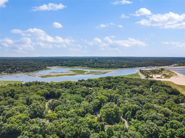 a view of a lake with beach and ocean