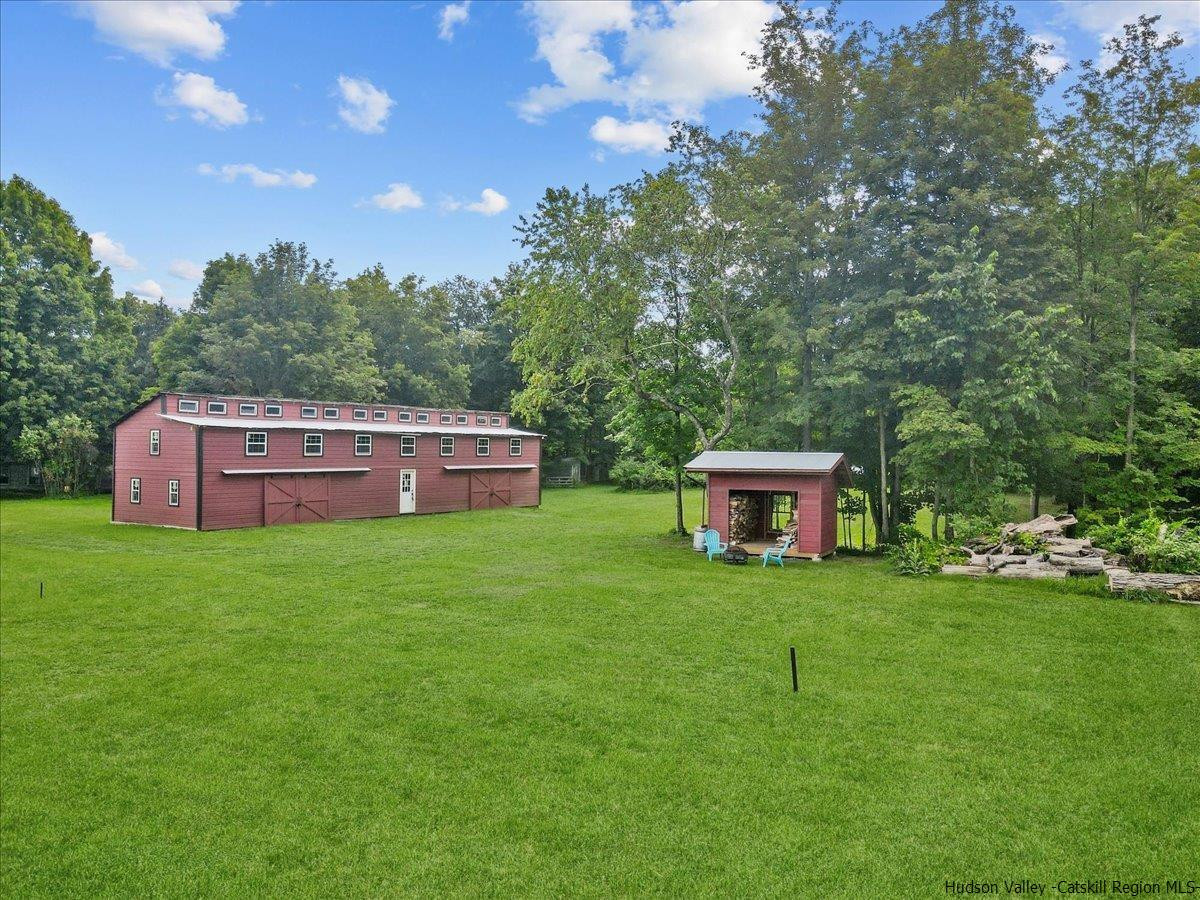 45 Pine Bush Road Stone Ridge, NY 12484 - Photo 29 of 34 a front view of a house with garden
