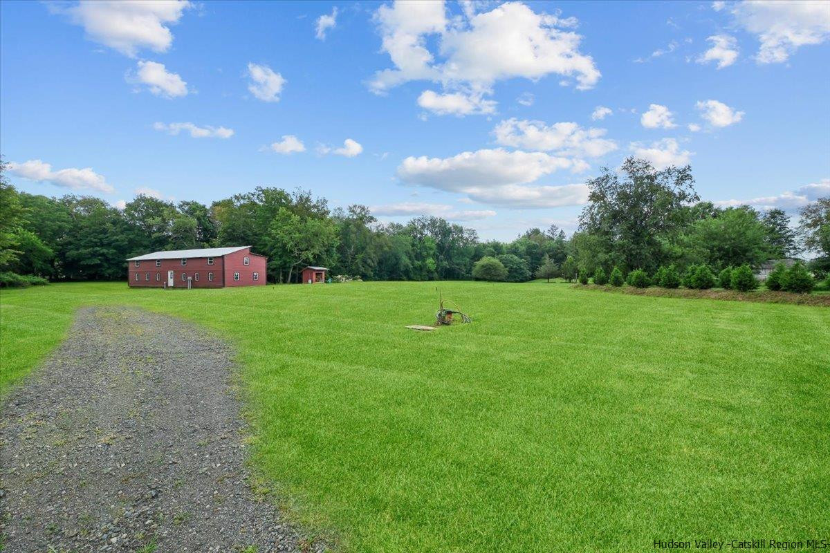 45 Pine Bush Road Stone Ridge, NY 12484 - Photo 5 of 34 a view of a golf course with a swimming pool