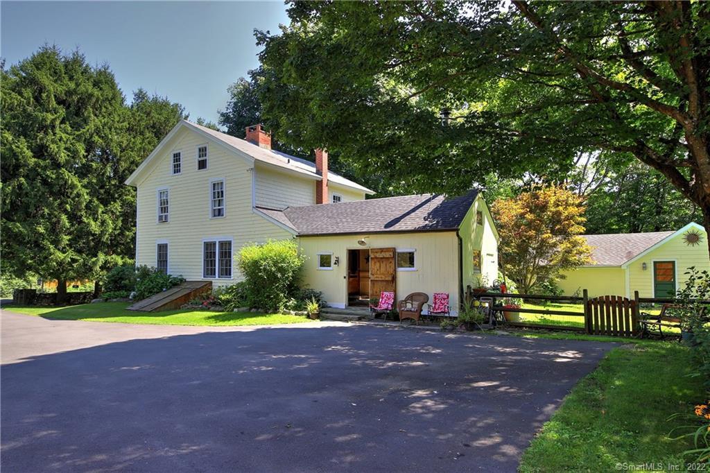 435 Elm Street Monroe, CT 06468 - Photo 1 of 1 a view of a house with a yard and large trees