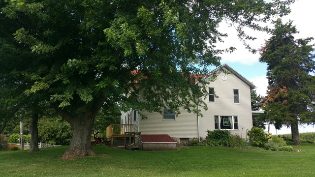1645 Maytown Road Sublette, IL 61367 - Photo 19 of 21 a view of house with backyard and garden