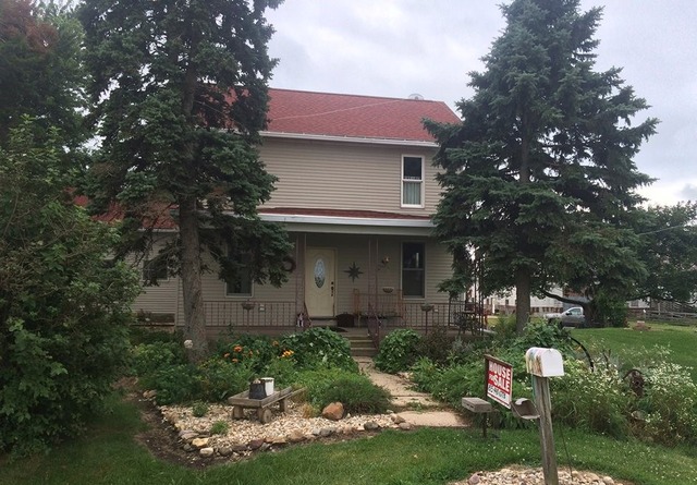 1645 Maytown Road Sublette, IL 61367 - Photo 3 of 21 a view of a house with a yard and plants