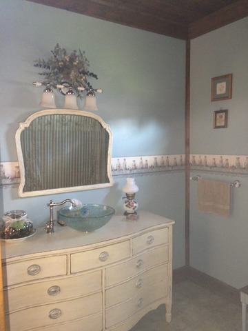 1645 Maytown Road Sublette, IL 61367 - Photo 8 of 21 a bathroom with a sink and a mirror