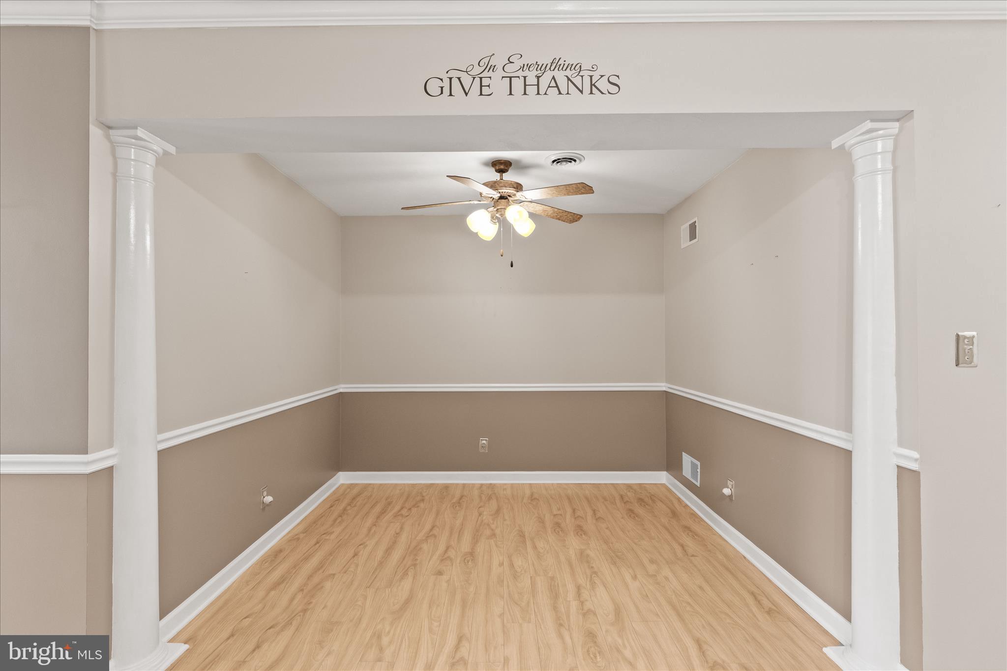 714 Randolph Street Hanover, PA 17331 - Photo 12 of 33 a view of a room with a sink a ceiling fan and wooden floor