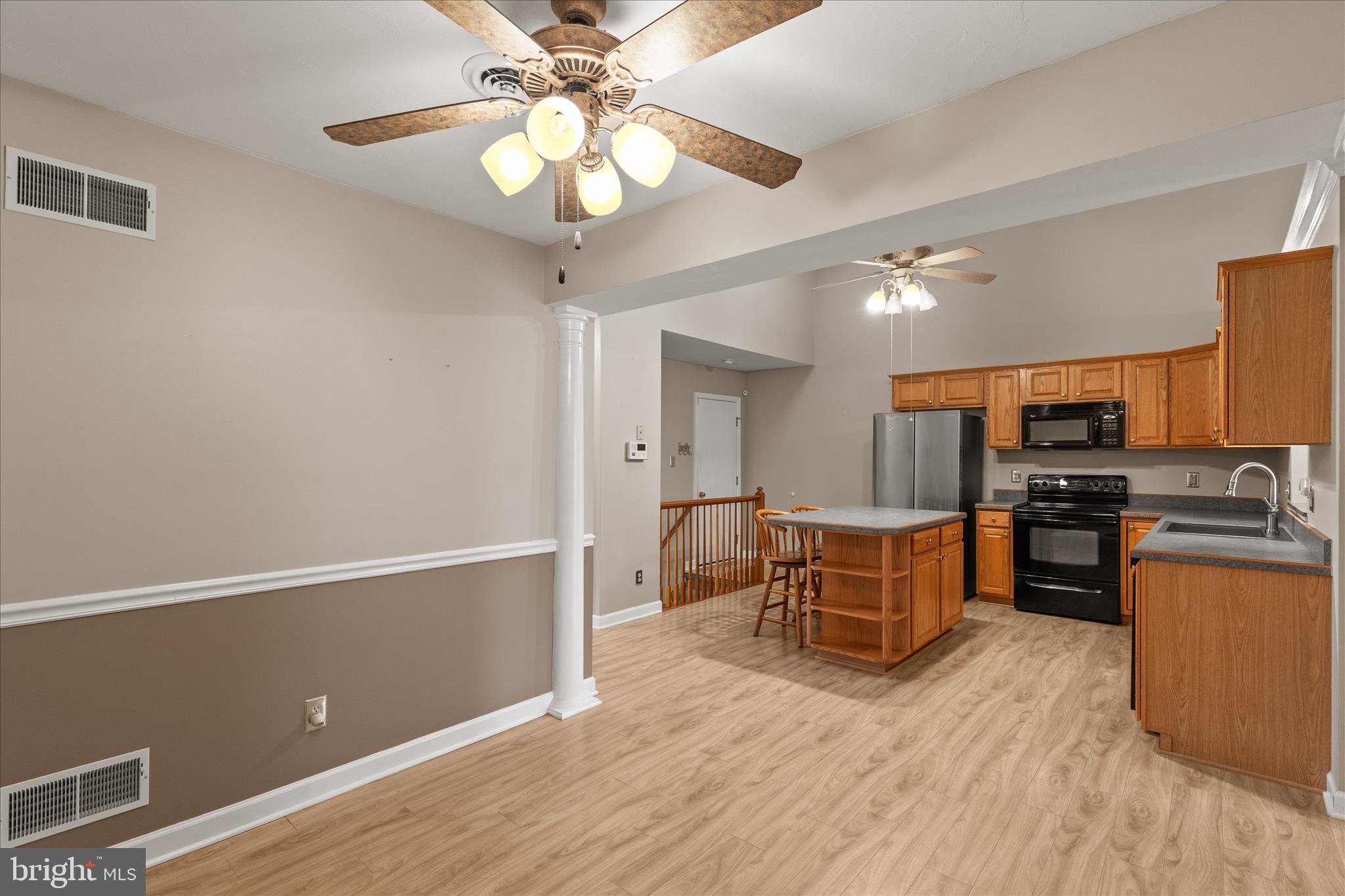 714 Randolph Street Hanover, PA 17331 - Photo 13 of 33 a living room with stainless steel appliances kitchen island granite countertop furniture and a kitchen view