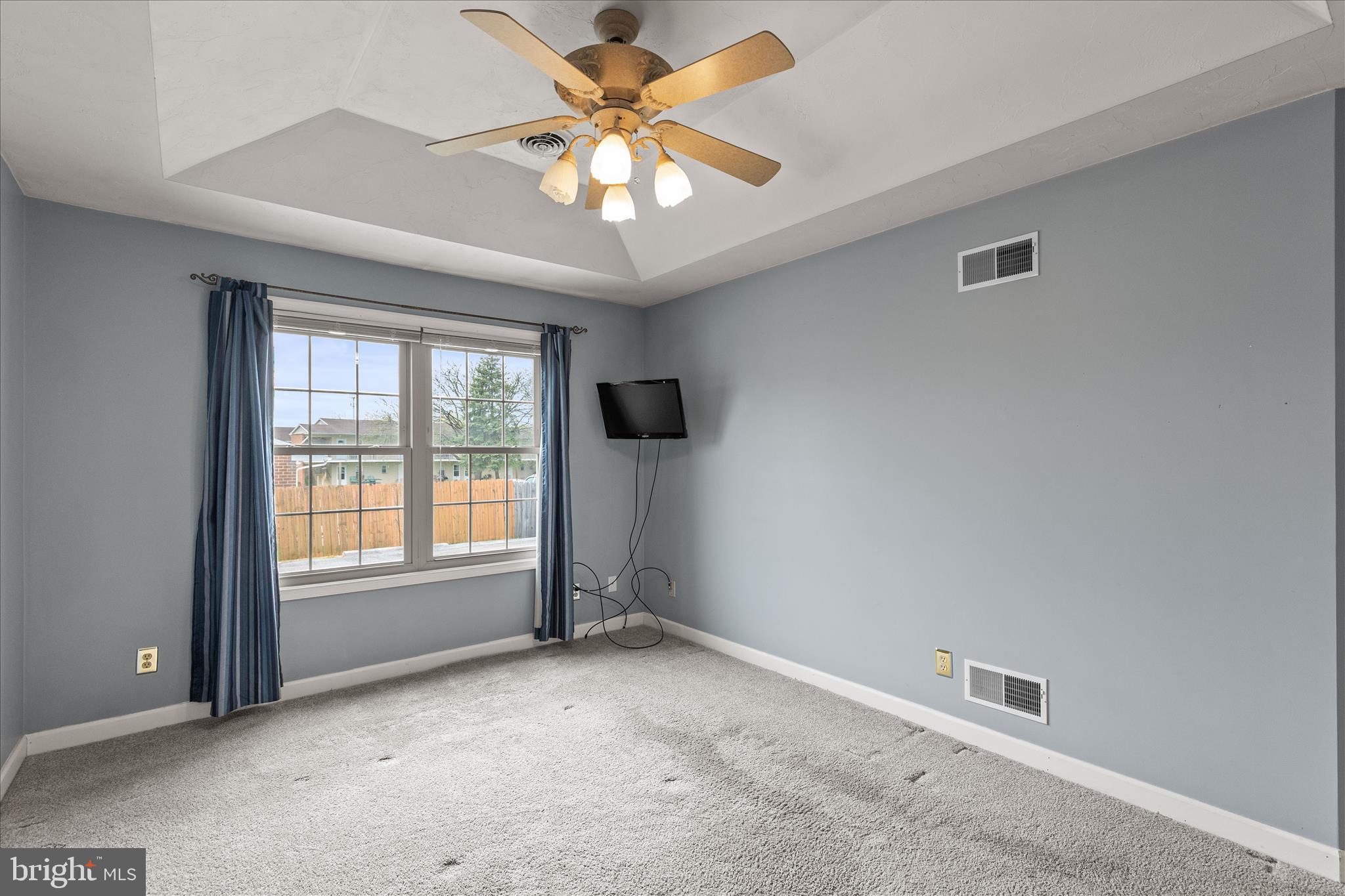 714 Randolph Street Hanover, PA 17331 - Photo 15 of 33 an empty room with windows and fan