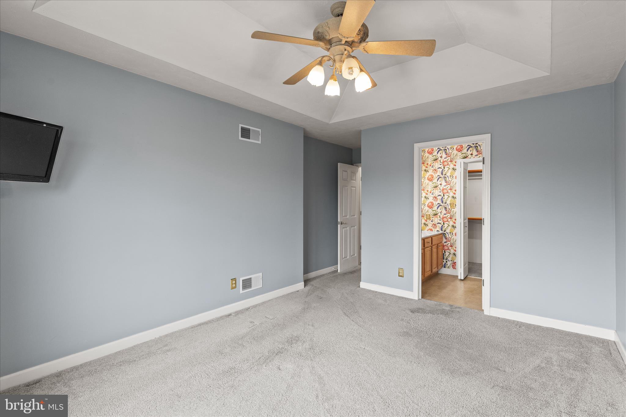 714 Randolph Street Hanover, PA 17331 - Photo 16 of 33 an empty room with windows and fan