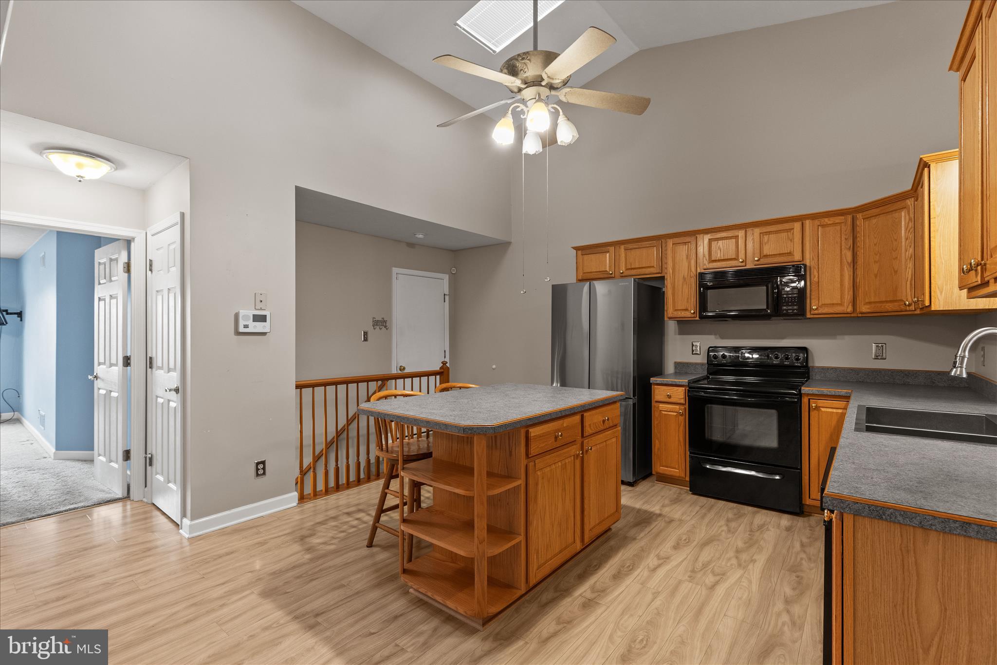 714 Randolph Street Hanover, PA 17331 - Photo 8 of 33 a kitchen with a stove a refrigerator and a sink