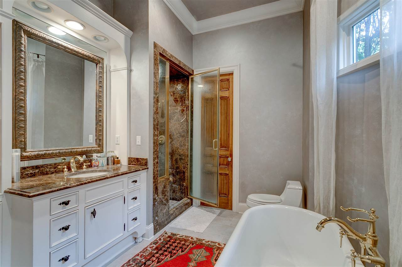 144 Overlook Place Ridgeland, MS 39157 - Photo 20 of 42 Two vanities Footed tub separate shower
