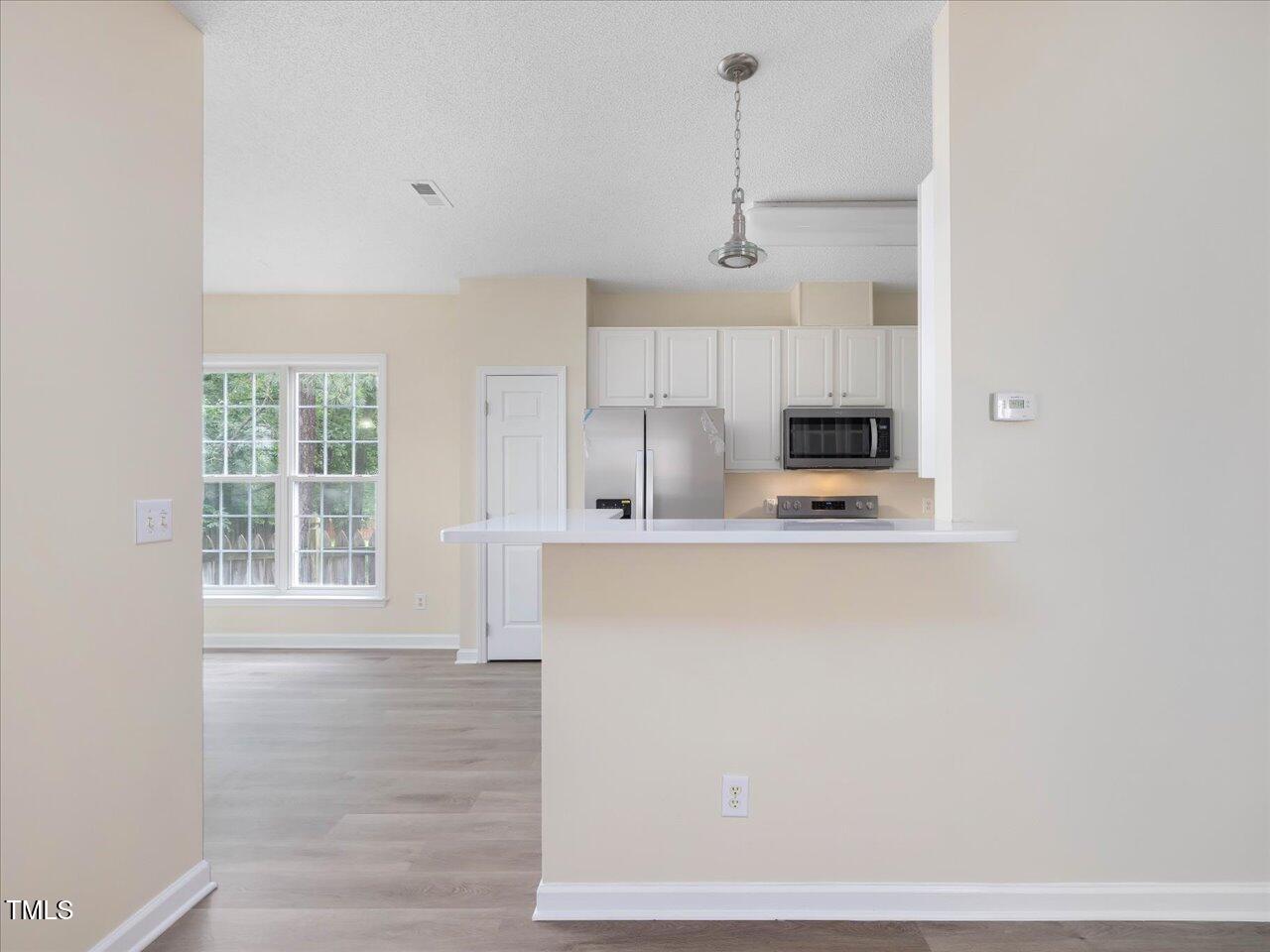 1928 Shadow Glen Drive Raleigh, NC 27604 - Photo 13 of 60 13-Breakfast Bar