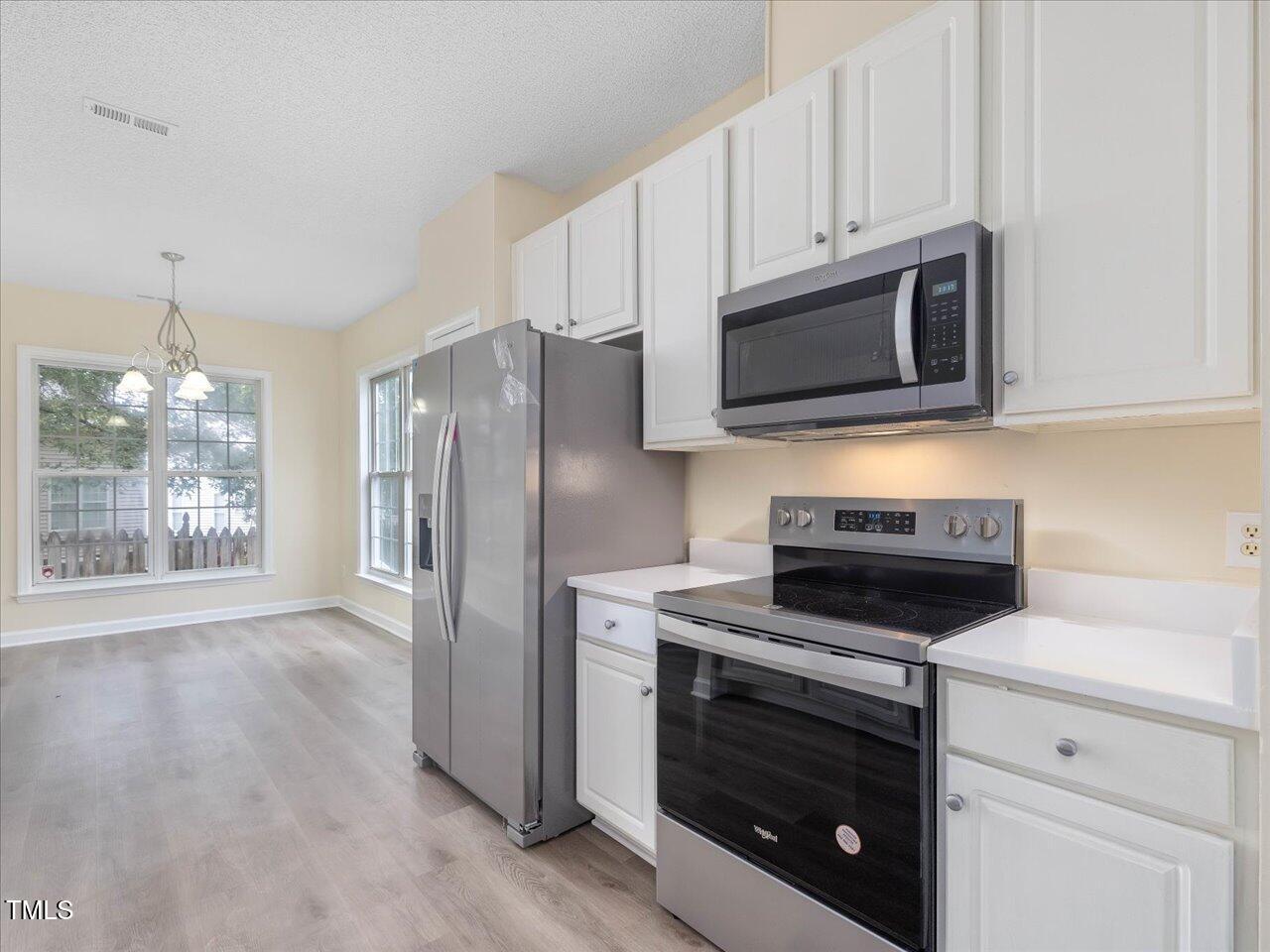 1928 Shadow Glen Drive Raleigh, NC 27604 - Photo 18 of 60 18-Kitchen