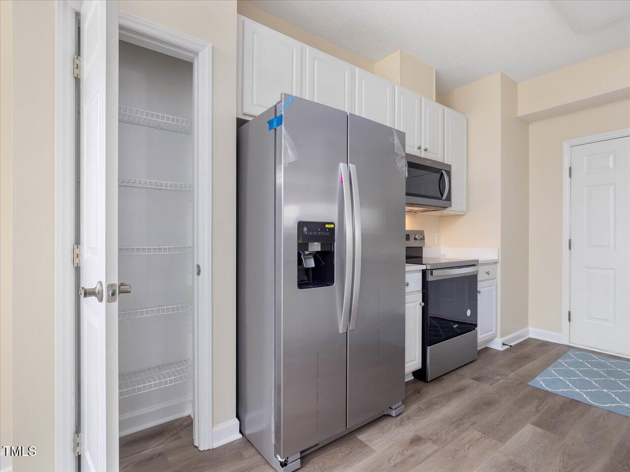 1928 Shadow Glen Drive Raleigh, NC 27604 - Photo 19 of 60 19-Pantry