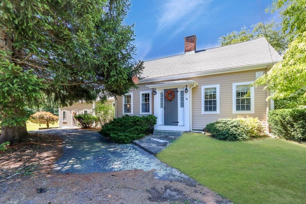 1401 Bay Road Sharon, MA 02067 - Photo 1 of 37 a front view of a house with garden