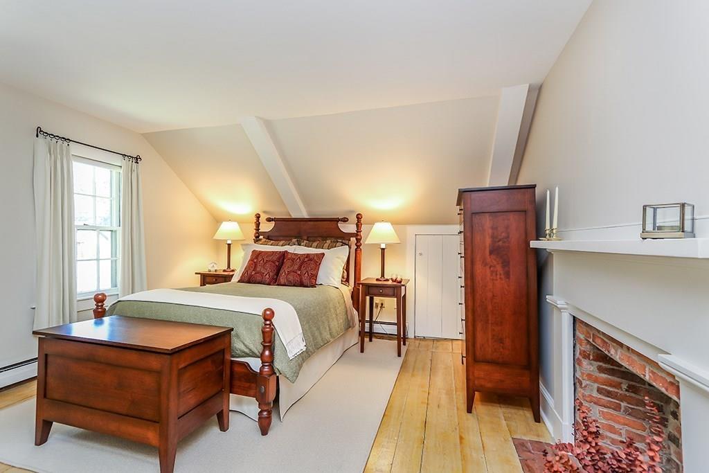 1401 Bay Road Sharon, MA 02067 - Photo 25 of 37 a bedroom with bed and wooden floor