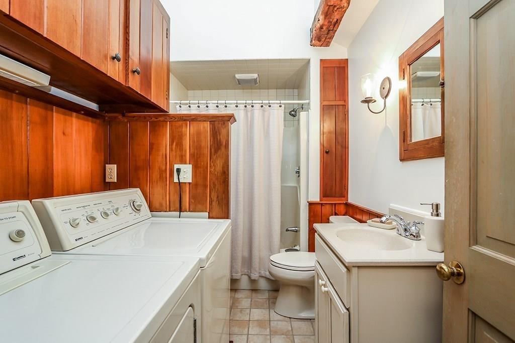 1401 Bay Road Sharon, MA 02067 - Photo 29 of 37 a bathroom with a sink a toilet and shower