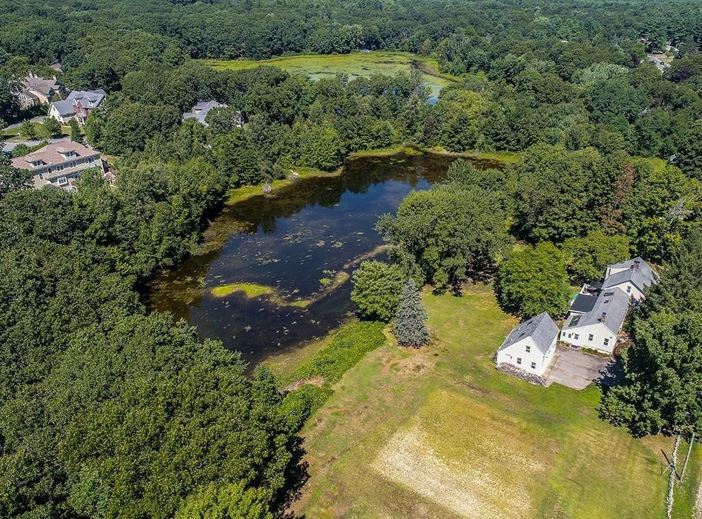 1401 Bay Road Sharon, MA 02067 - Photo 3 of 37 an aerial view of residential houses with outdoor space