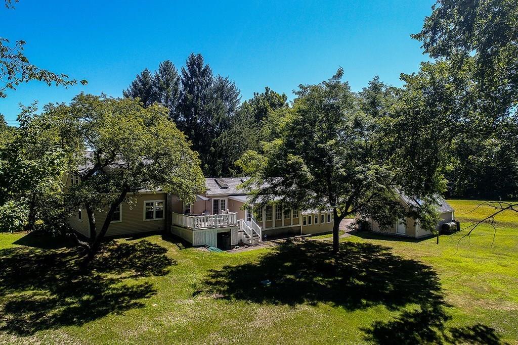 1401 Bay Road Sharon, MA 02067 - Photo 31 of 37 a view of a house with a yard