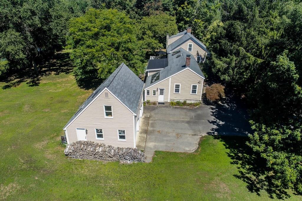 1401 Bay Road Sharon, MA 02067 - Photo 34 of 37 a view of a house with a yard