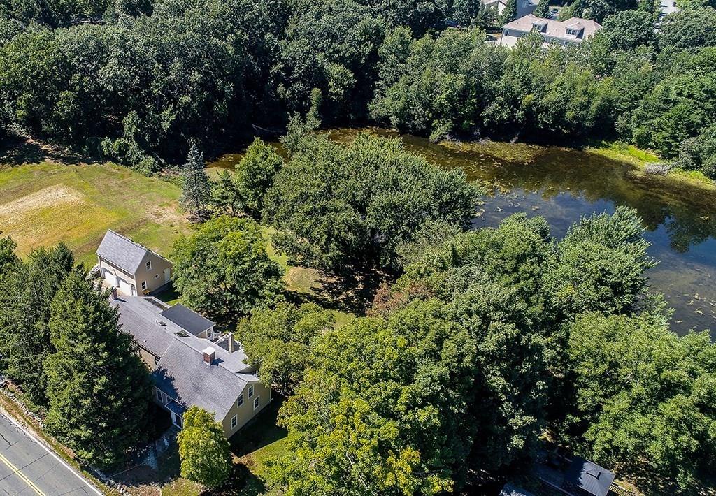 1401 Bay Road Sharon, MA 02067 - Photo 4 of 37 an aerial view of residential house with outdoor space and trees all around