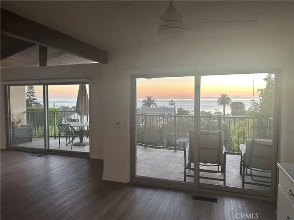 a kitchen with refrigerator and stove