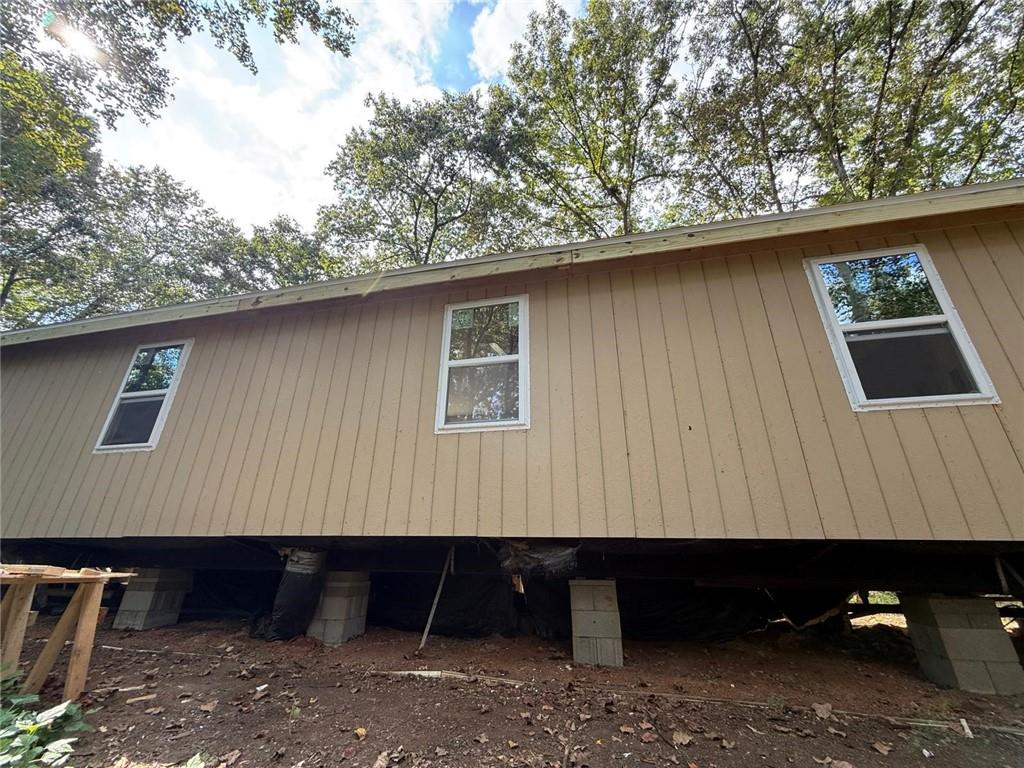 4683 Giddon Martin Road Gainesville, GA 30506 - Photo 2 of 7 a view of a small car parked in front of a house