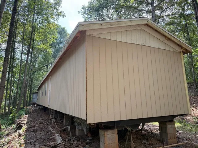 a house view with a backyard space