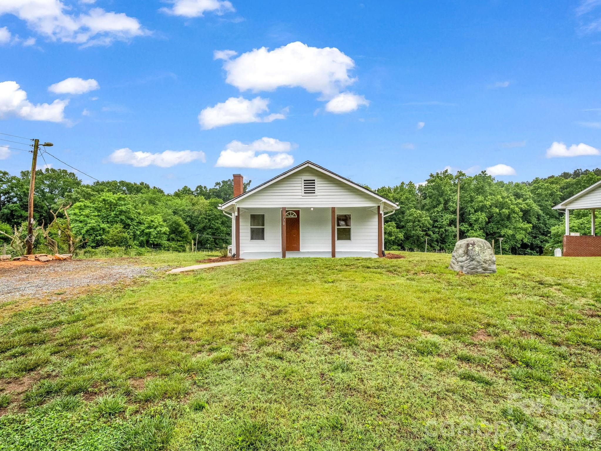 170 Dobbins Road Ellenboro, NC 28040 - Photo 6 of 32 a view of a house with a yard