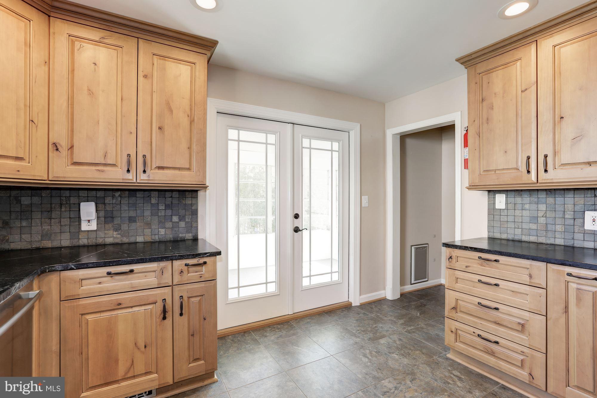11713 Kingtree Street Silver Spring, MD 20902 - Photo 9 of 26 Kitchen with Door to Porch