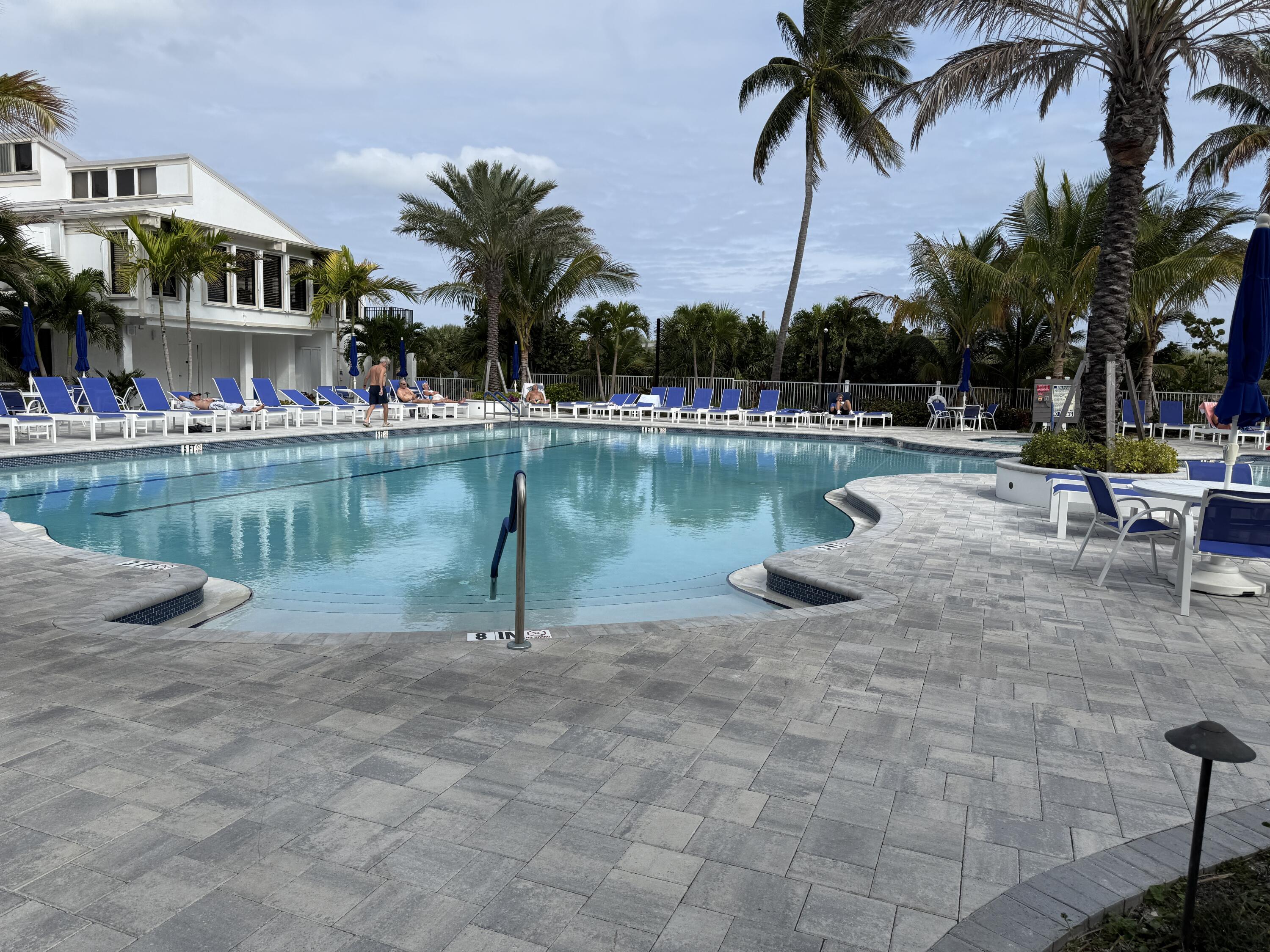 2400 South Ocean Drive, Unit 1034 Fort Pierce, FL 34949 - Photo 35 of 51 a view of a lake with a house and a park