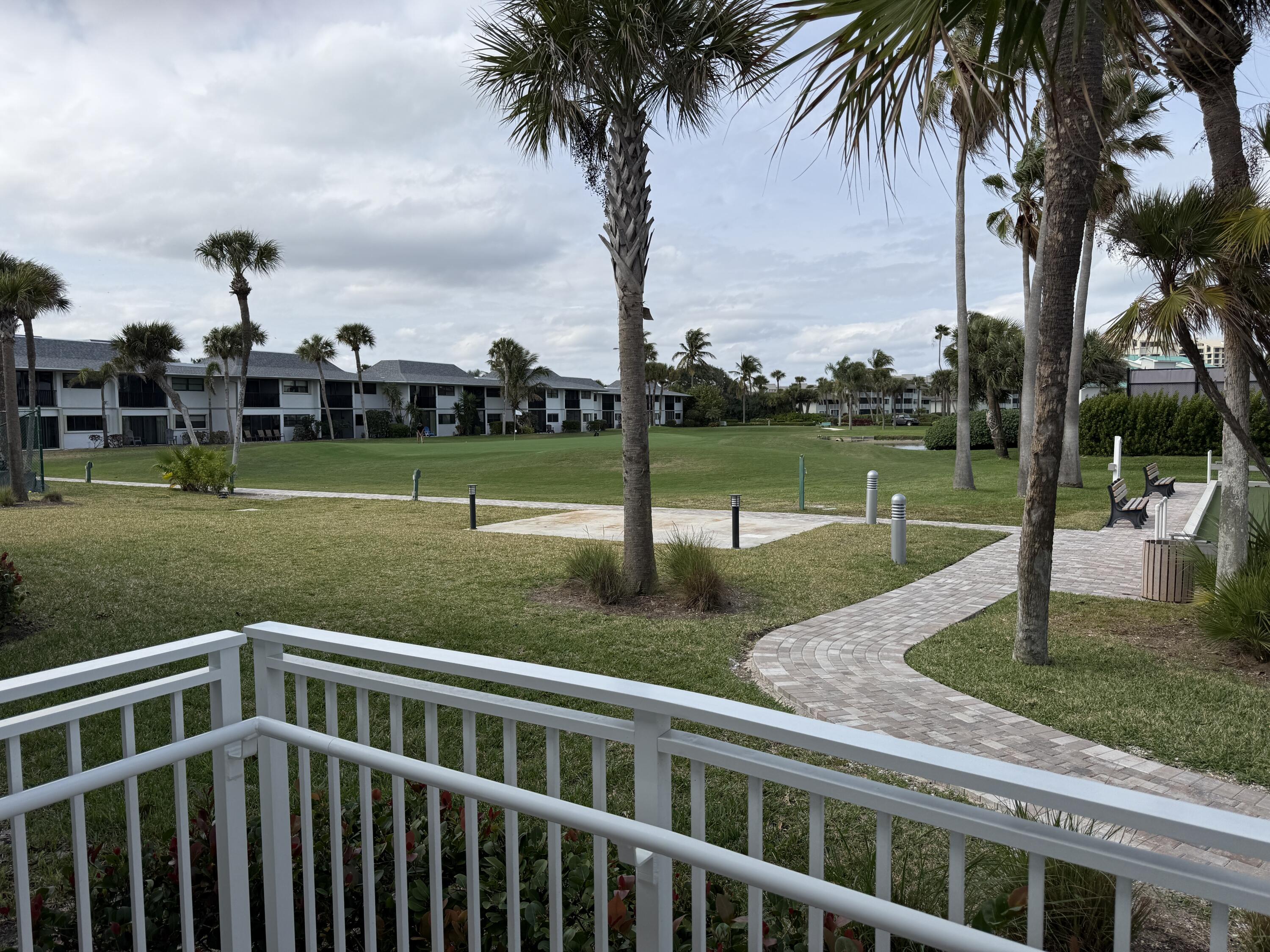 2400 South Ocean Drive, Unit 1034 Fort Pierce, FL 34949 - Photo 49 of 51 a view of a garden and lake