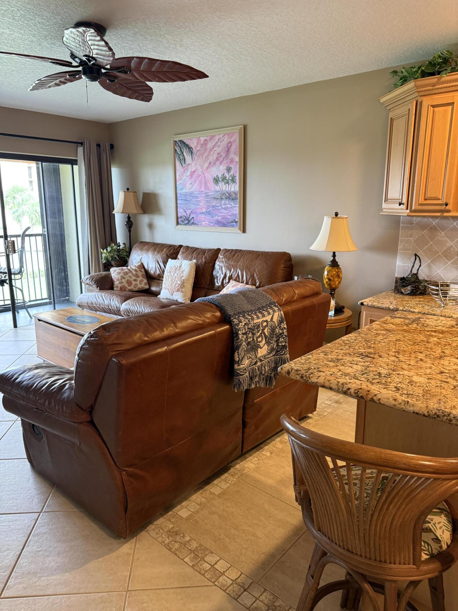 2400 South Ocean Drive, Unit 1034 Fort Pierce, FL 34949 - Photo 9 of 51 a bedroom with a bed and wooden floor