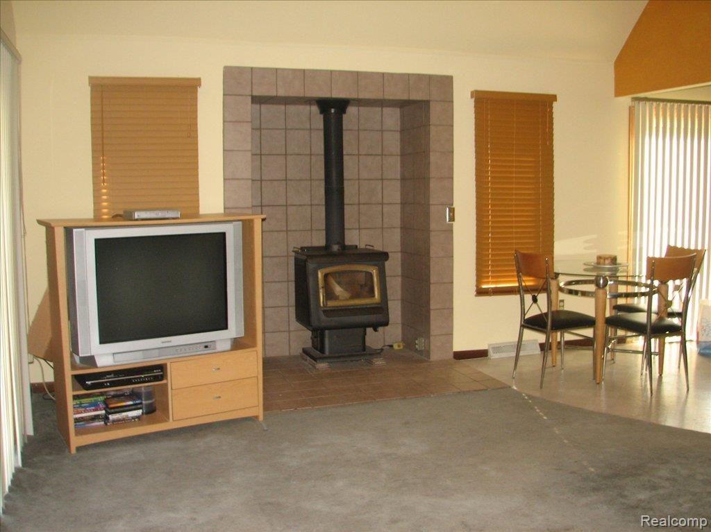 9700 Oakhill Road Holly, MI 48442 - Photo 17 of 20 Wood Burner