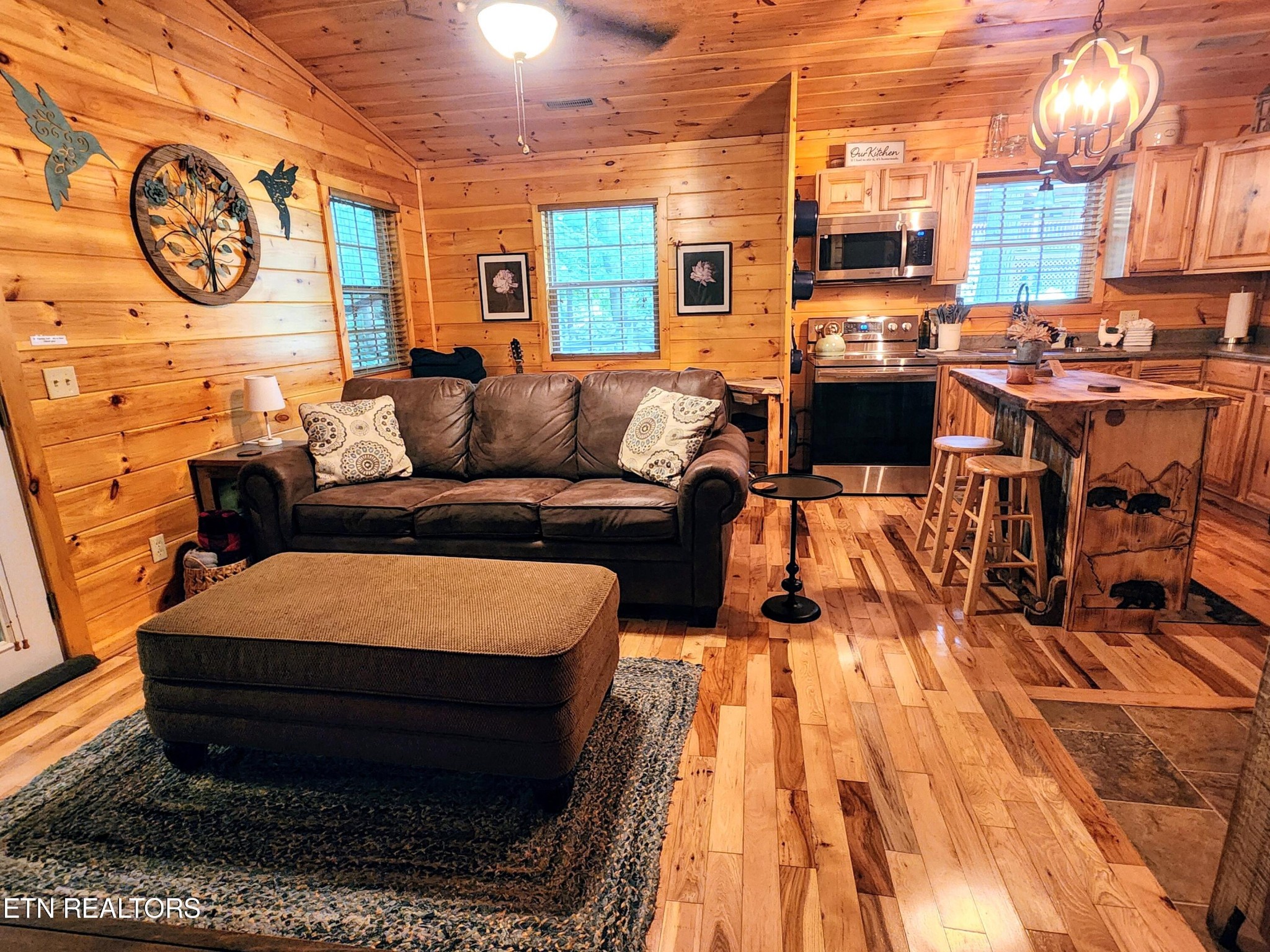 285 Sub Road Cosby, TN 37722 - Photo 8 of 26 a living room filled with furniture and a large window