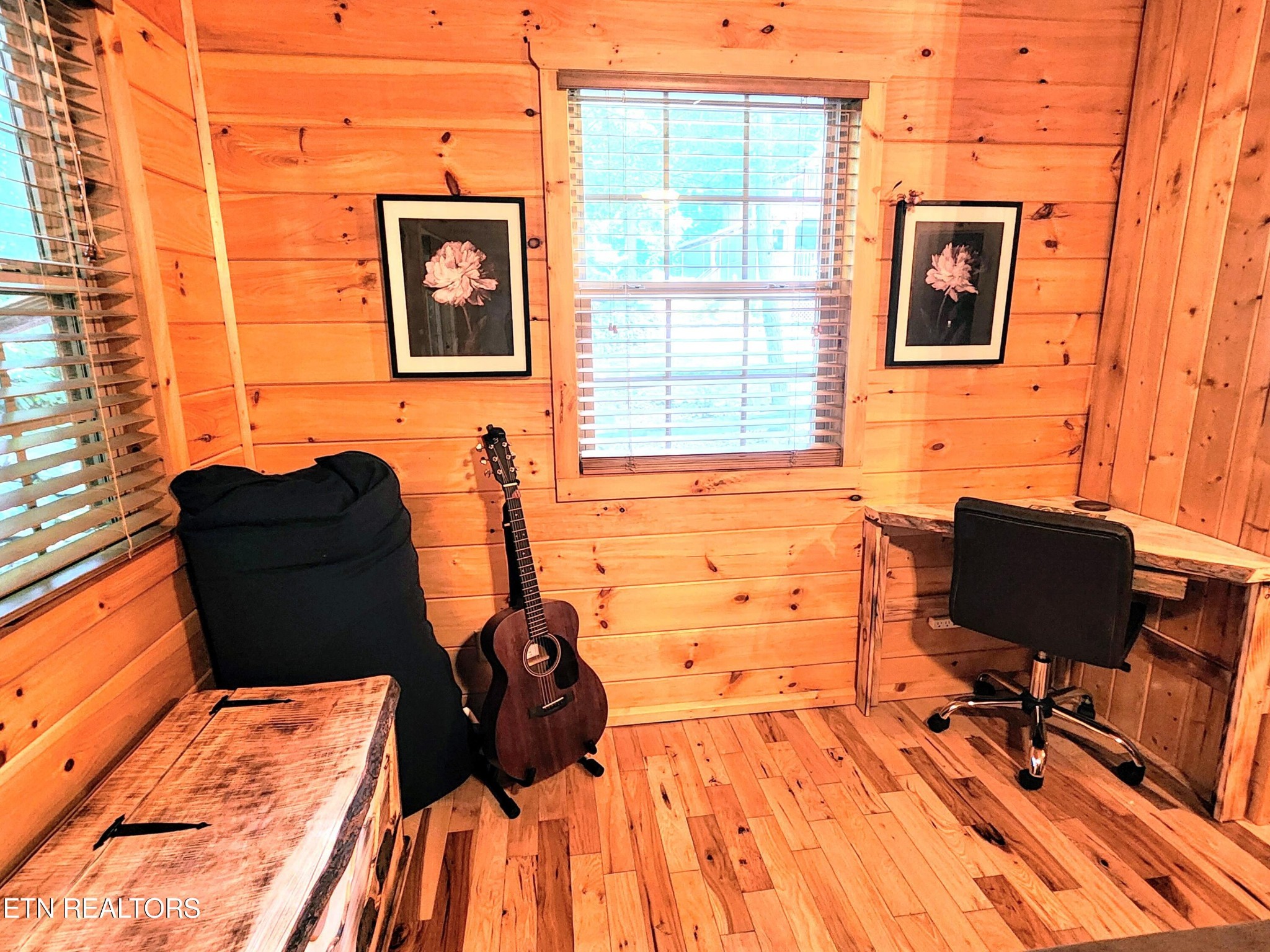285 Sub Road Cosby, TN 37722 - Photo 10 of 26 a bed sitting in a bedroom next to a window