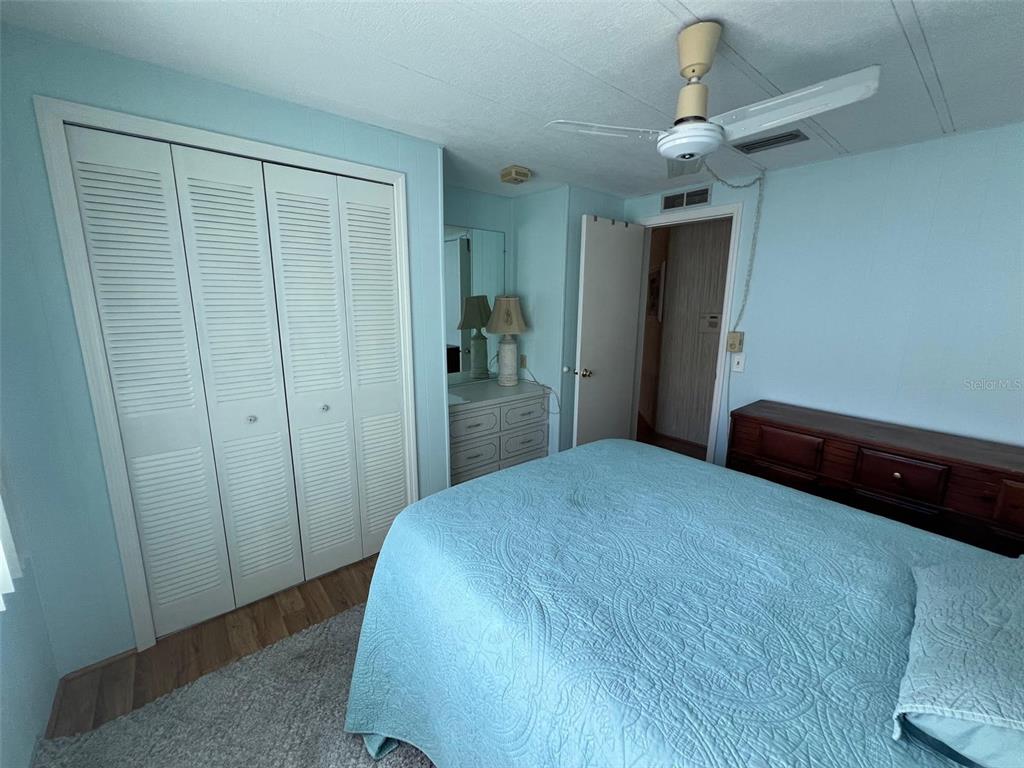 701 Sugar Palm Street Largo, FL 33770 - Photo 13 of 30 a bedroom with a bed and a window